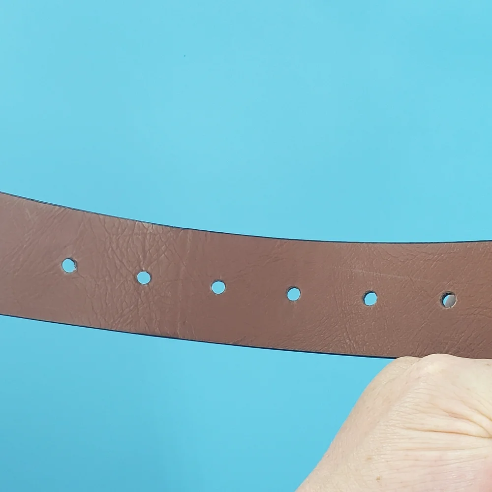 Black leather belt silver tone buckle